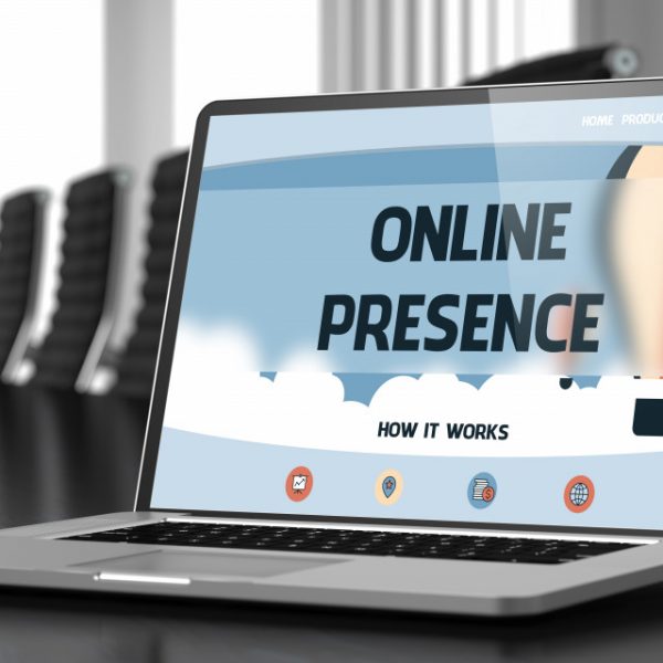 Online presence concept on laptop in office conference room