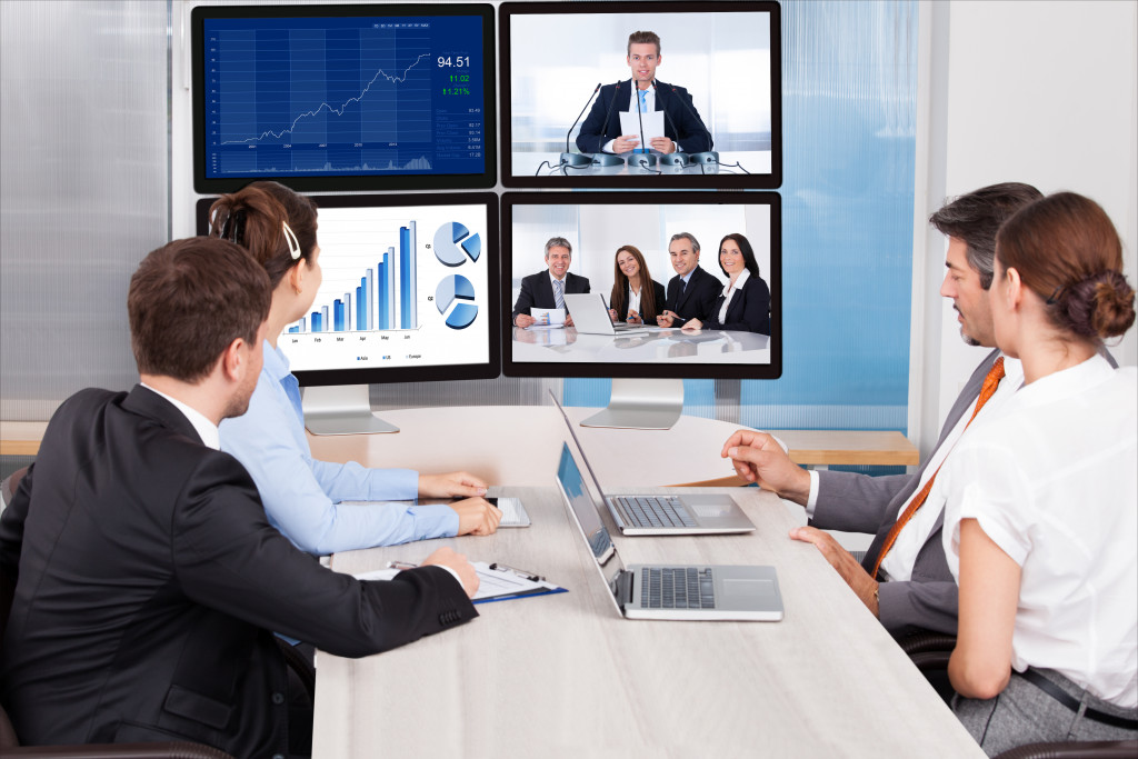 A virtual meeting on different setting with monitor with different screens